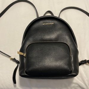 Micheal Kors purse backpack